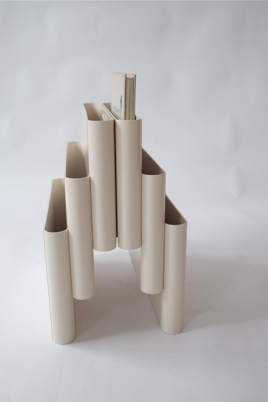 Kartell magazine rack by Giotto Stoppino