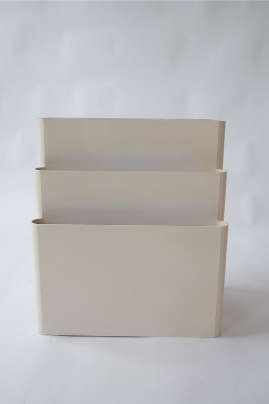 Kartell magazine rack by Giotto Stoppino