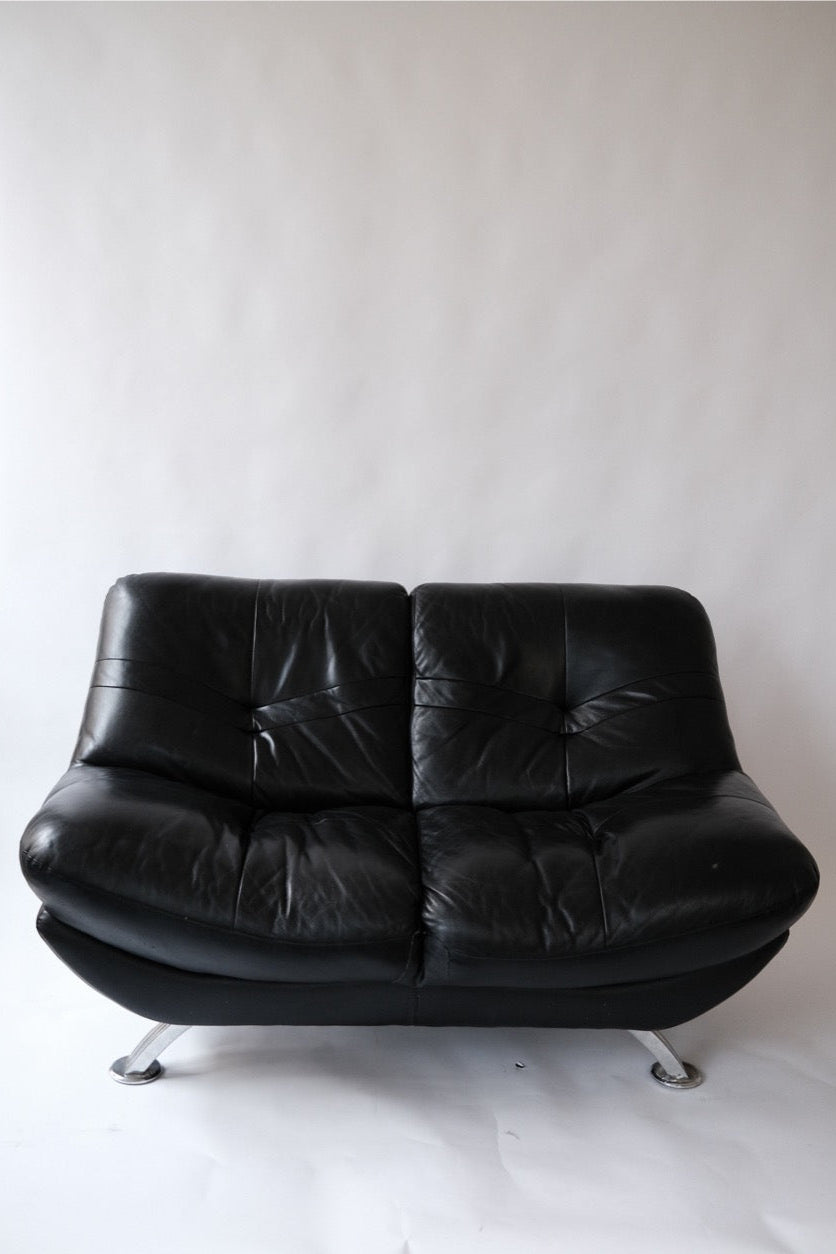 2-person puffy leather couch